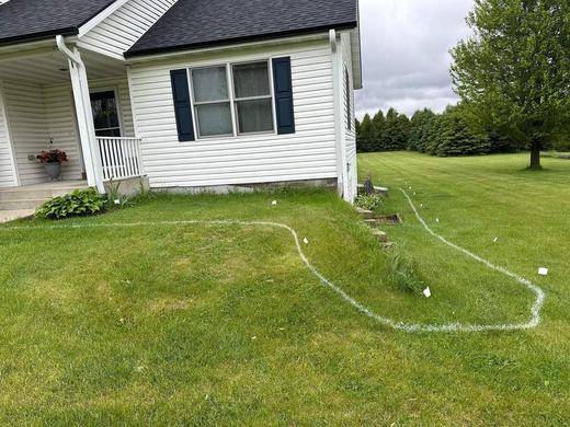 Marked out lawn area before landscaping work